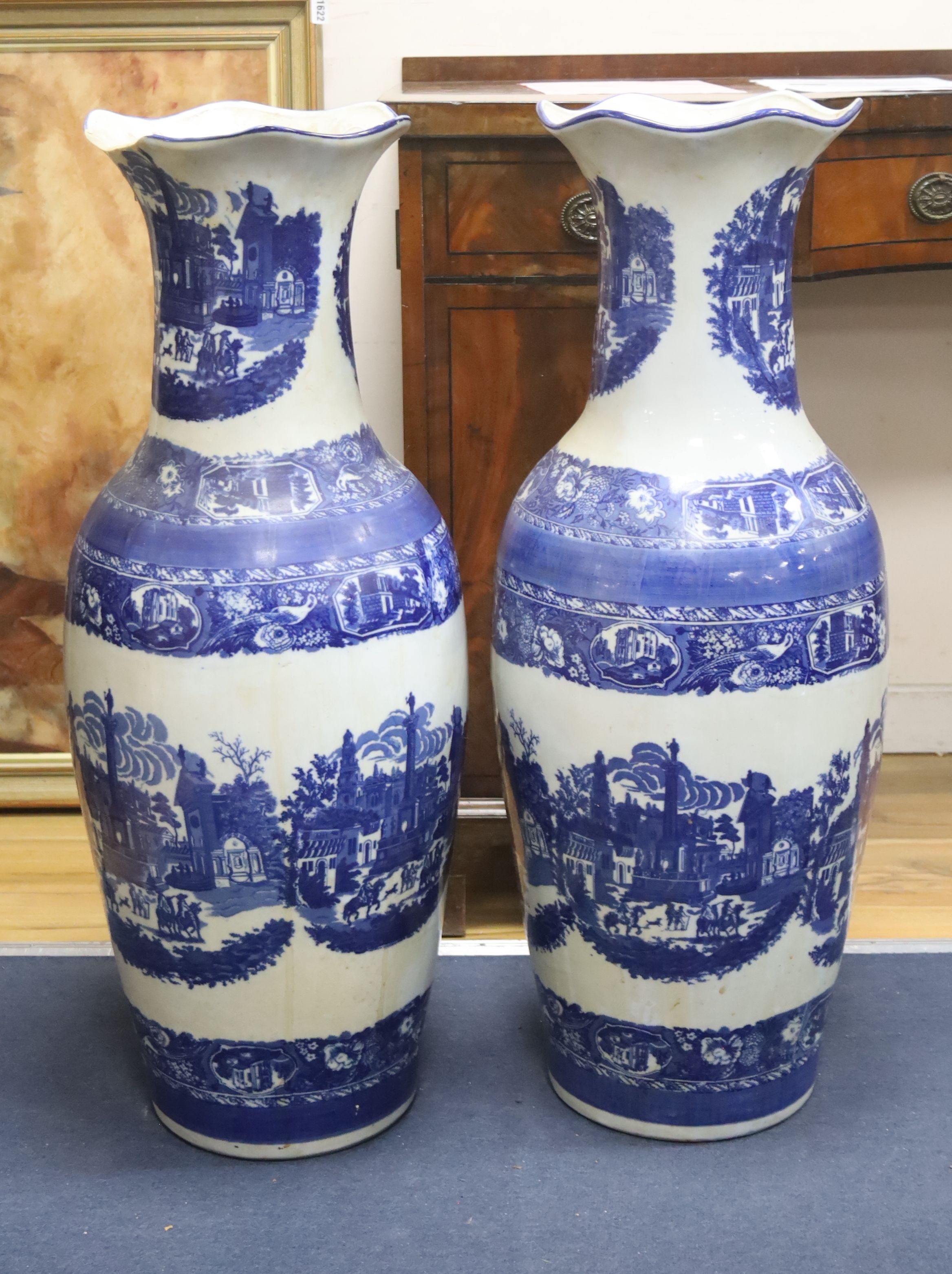 A pair of large blue and white vases 92cm